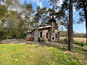 Luxe, sfeervolle 6 persoons bungalow met open haard in prachtig natuurgebied
